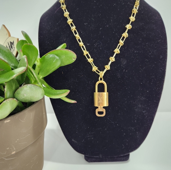 Authentic Louis Vuitton lock on unbranded necklace chain